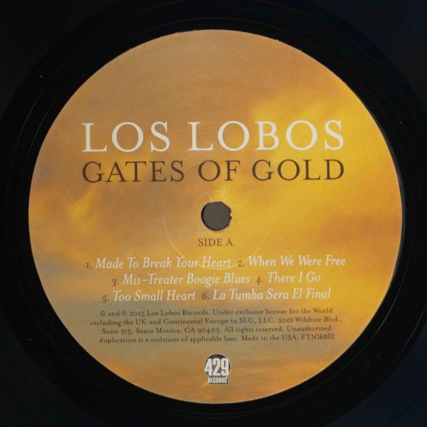 Vinyl record label for 'Gates of Gold' by Los Lobos with track listing.