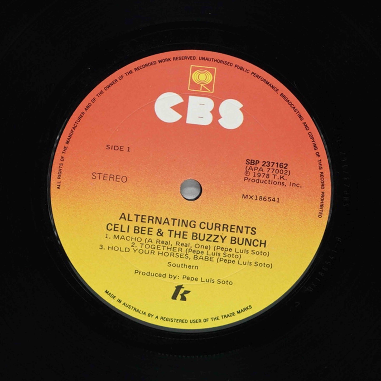 Record label with CBS logo and album details on a black background